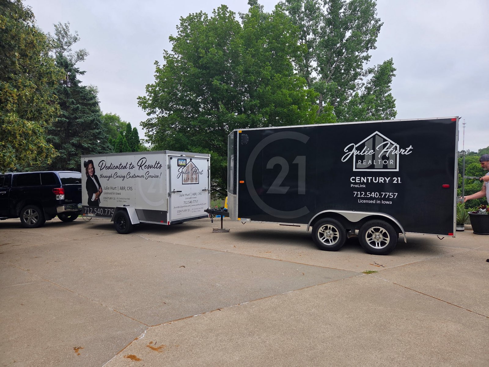 Julie Hurt's client moving trailer being loaded by homeowners during moving day in Le Mars, Iowa.
